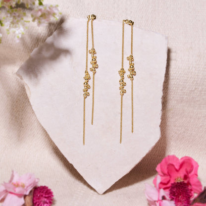 Gold molten long Statement Earrings - Gilded Beads